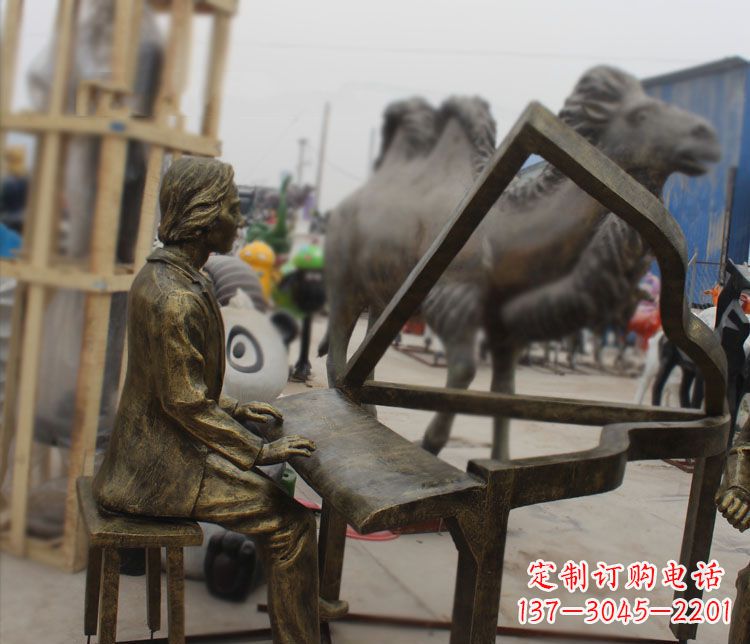 商丘弹抽象钢琴的人物铜雕
