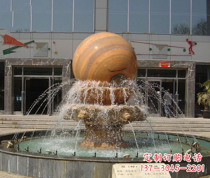 商丘石来运转球晚霞红风水球石雕