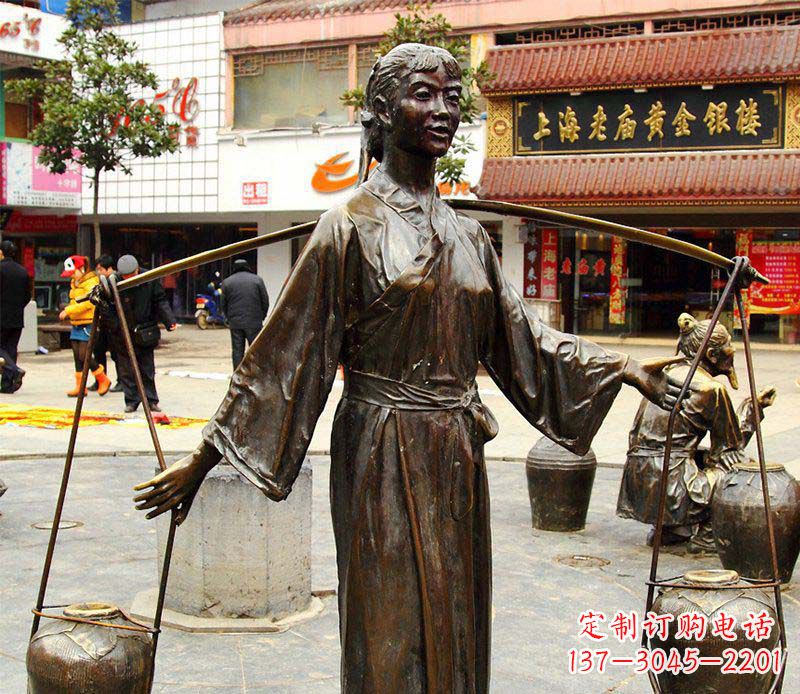 商丘挑着罐子的古代女人铜雕