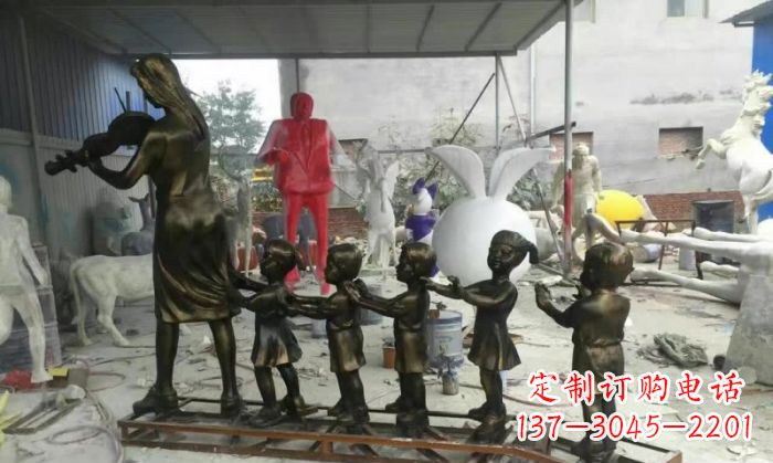 商丘校园老师和儿童铜雕